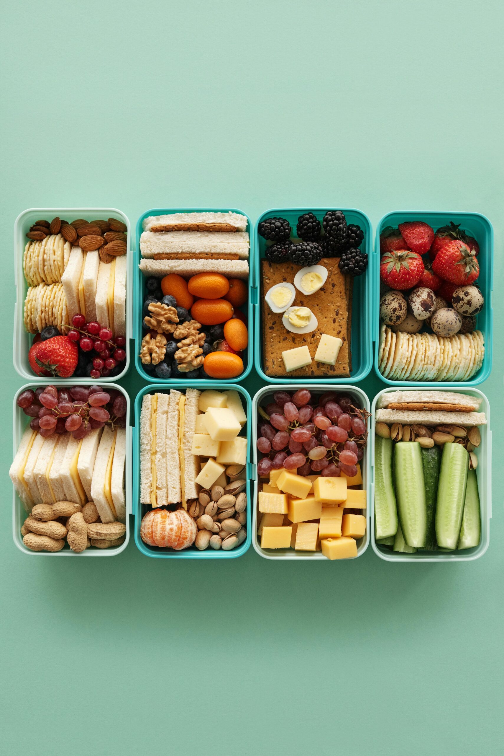Healthy snacks for weight loss including berries, almonds, and yogurt on a table