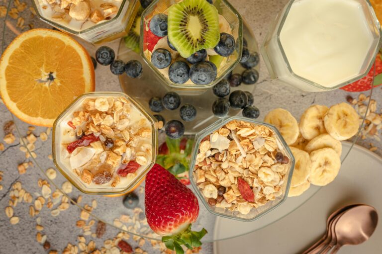 Best foods for gut health including yogurt, berries, and leafy greens