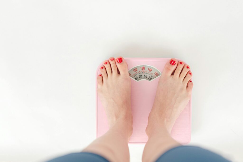Weight changes caused as a sign of hormonal imbalance in females.